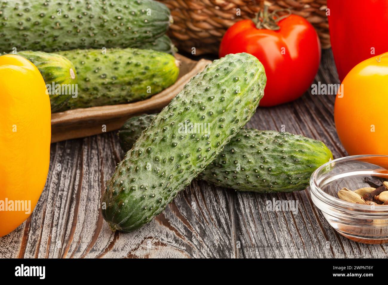 fresh pickling cucumber group on wood background Stock Photo