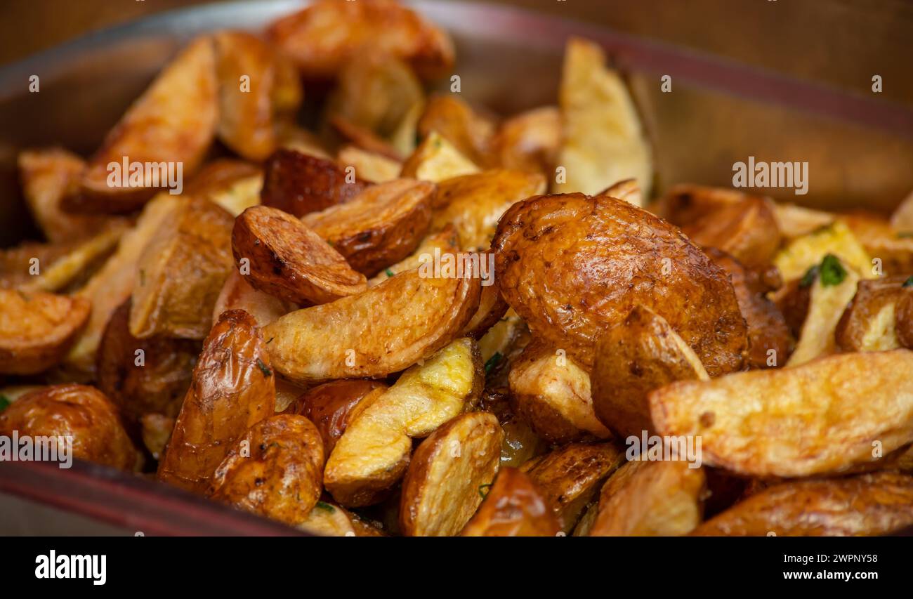 delicious grilled fried potatoes. street food. potat Stock Photo - Alamy