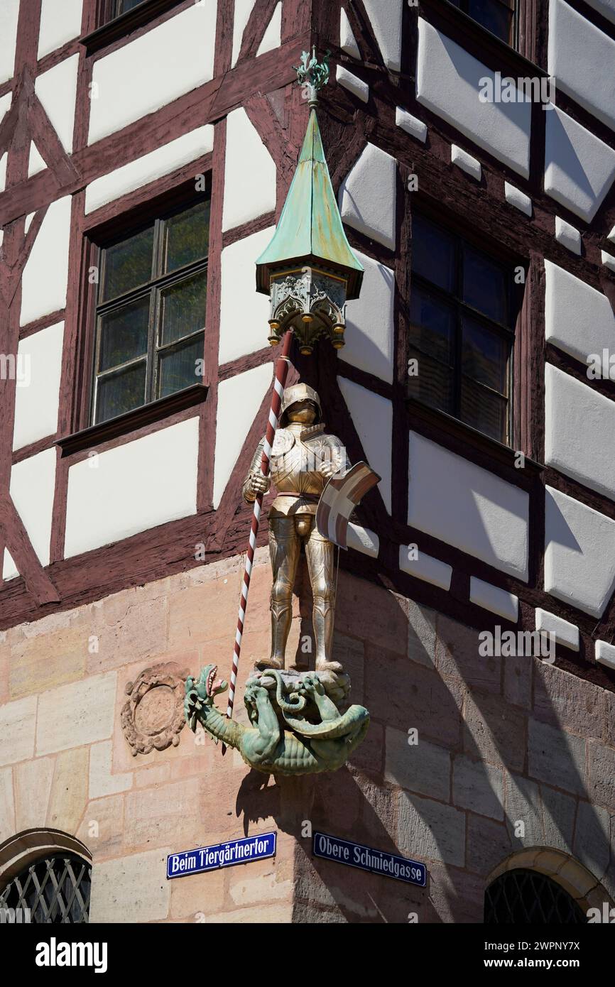 Germany, Bavaria, Middle Franconia, Nuremberg, Old Town, near Tiergärtnertor, Pilatus House, facade, corner figure, St. George as dragon slayer Stock Photo