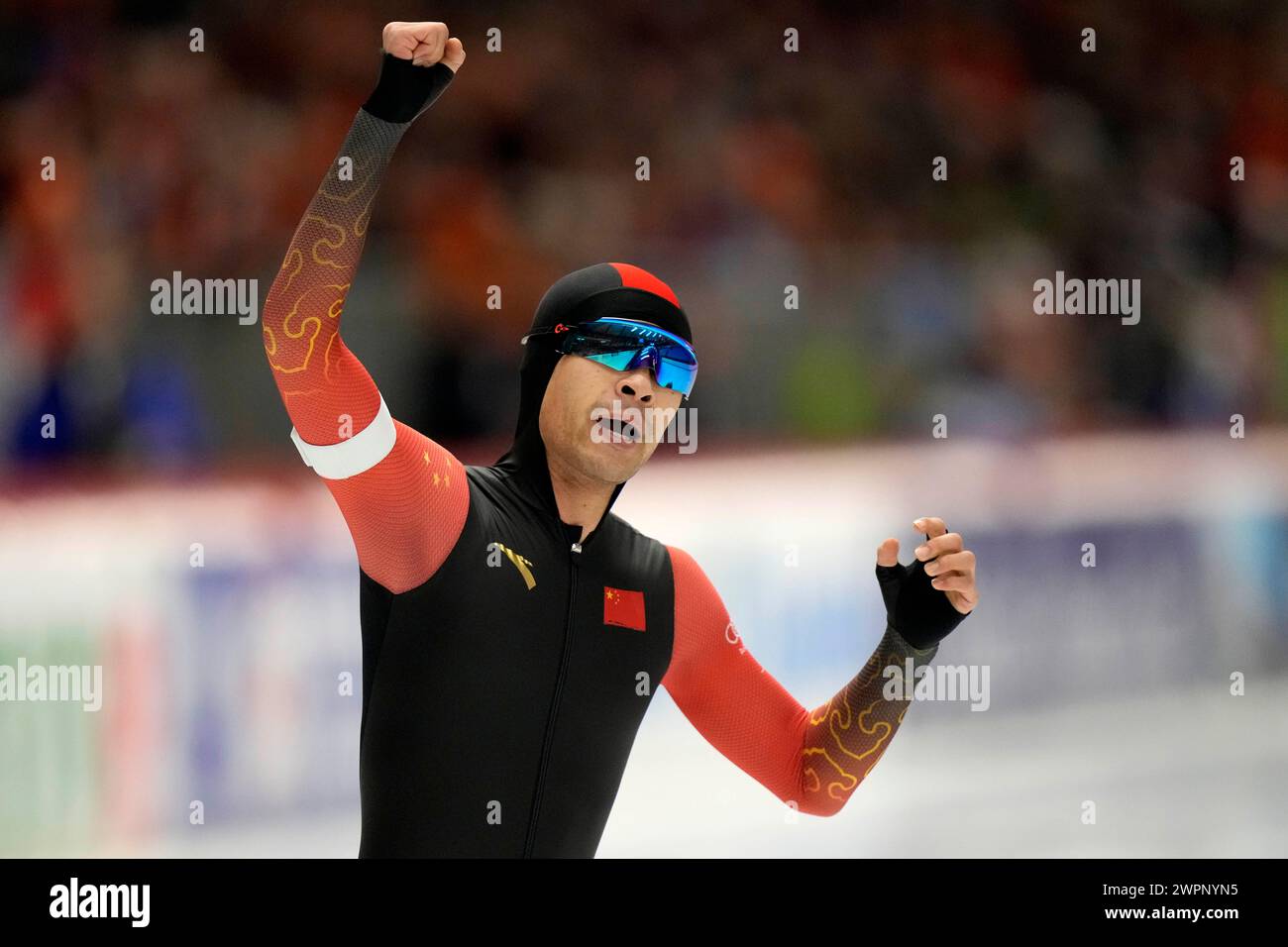 Zhongyan Ning of China celebrates winning the 2nd men's 1000meter
