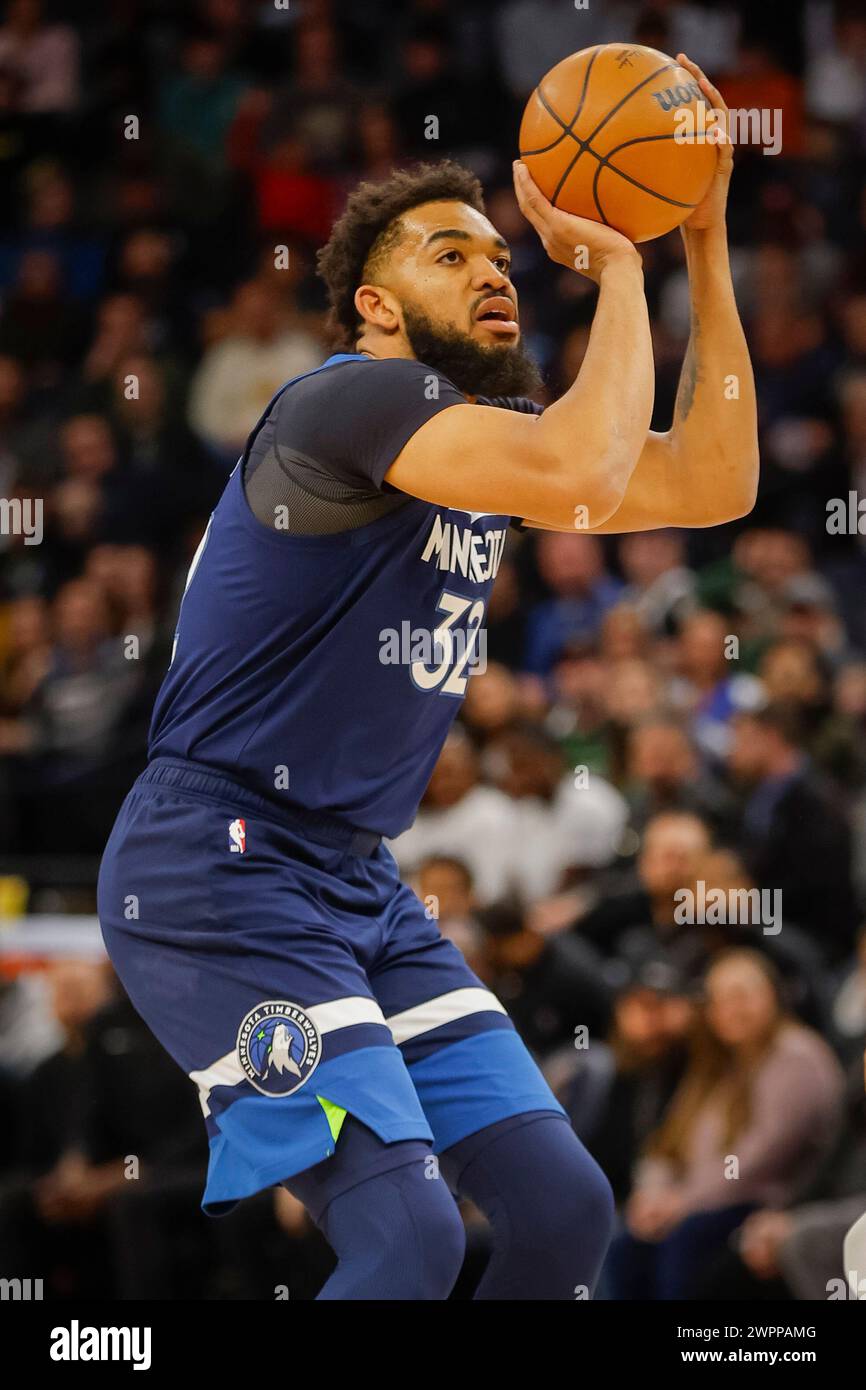 Minnesota Timberwolves forward Karl-Anthony Towns (32) shoots against