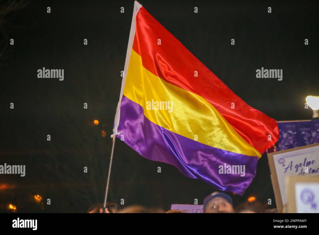 La Felguera, Spain, 08th March, 2024: The flag of Spain of the Republic during the Demonstration of the 8M Commission in Langreo for International Women's Day 2024, on March 08, 2024, in La Felguera, Spain. Credit: Alberto Brevers / Alamy Live News. Stock Photo
