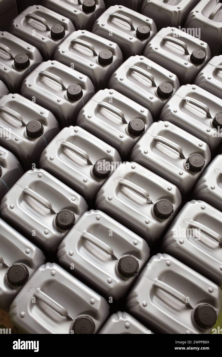 Lubricating oil in typical containers Stock Photo