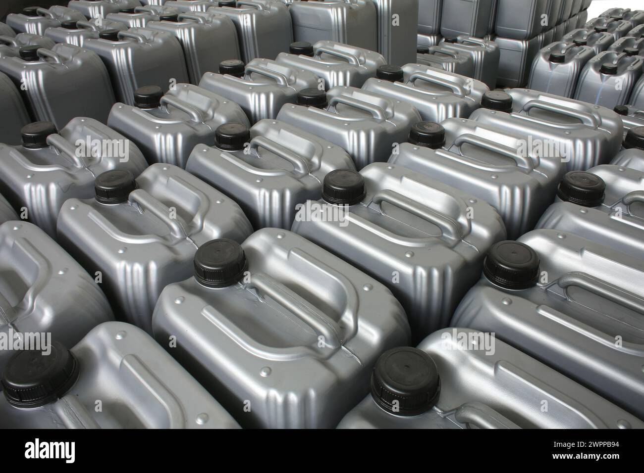 Lubricating oil in typical containers Stock Photo