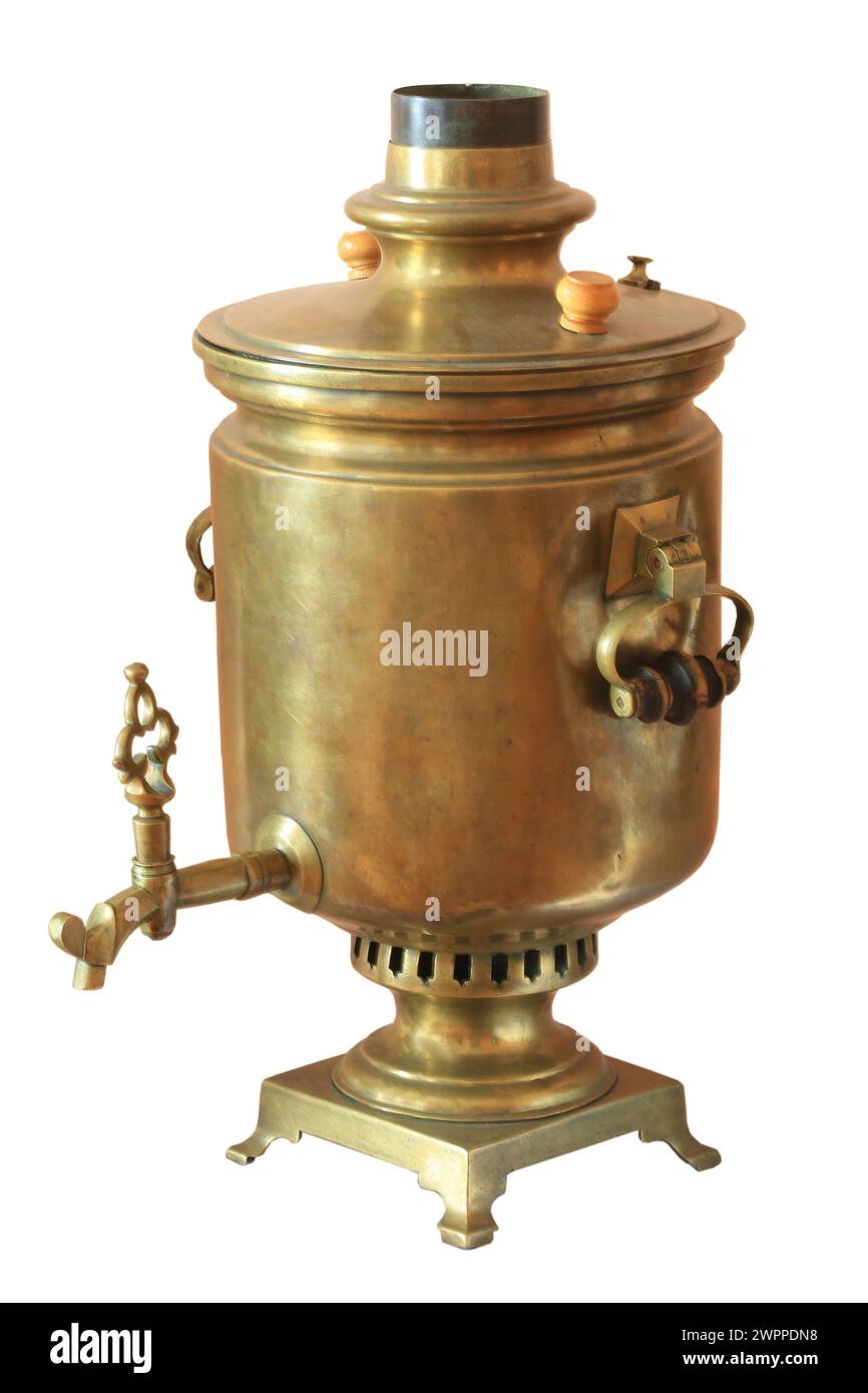 Old samovar isolated on a white background. gosptsvetmetzavod in the kolchugena, 20-30 years of XVX of century copper a tree, factory production, Russ Stock Photo