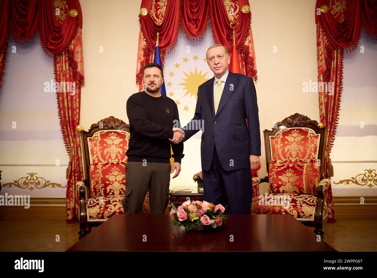 Istanbul, Turkey. 08th Mar, 2024. Ukrainian President Volodymyr Zelenskyy, left, and Turkish Prime Minister Recep Tayyip Erdogan, right, shake hands before a bilateral meeting at Dolmabahce palace, March 8, 2024 in Istanbul, Turkey. Credit: Ukraine Presidency/Ukrainian Presidential Press Office/Alamy Live News Stock Photo