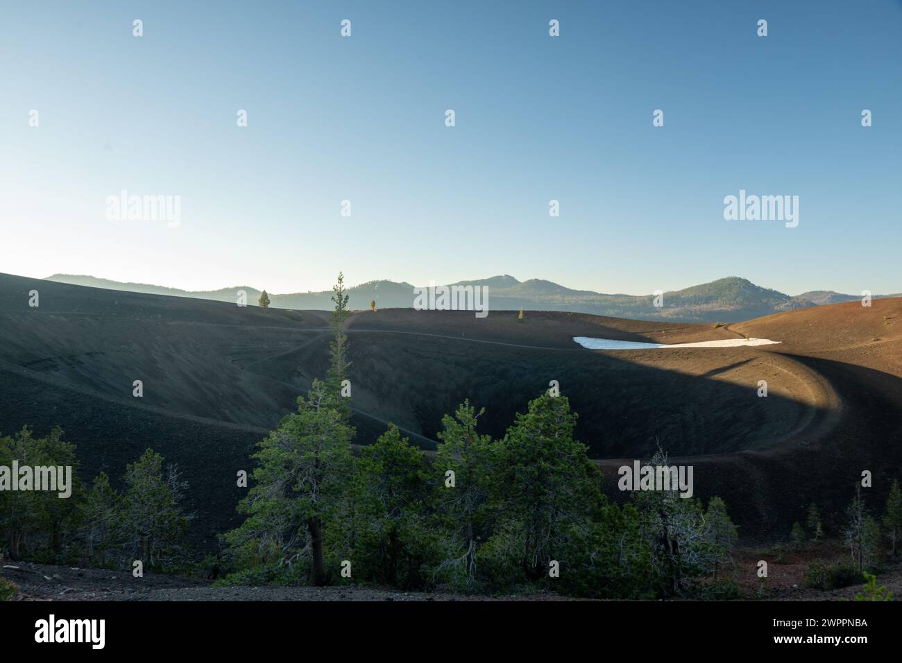 Morning Sun Begins to Light The Rim of Cinder Cone In Lassen Volcanic ...