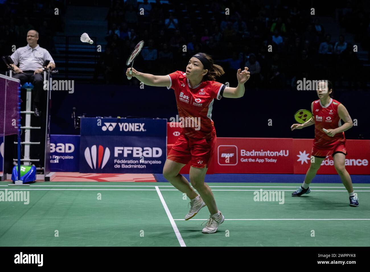 Paris, France. 8th Mar, 2024. Chen Qingchen (L)/Jia Yifan compete during the women's double quarterfinal match between Chen Qingchen/Jia Yifan of China and Treesa Jolly/Gayatri Gopichand Pullela of India at French Open Badminton tournament in Paris, France, March 8, 2024. Credit: Aurelien Morissard/Xinhua/Alamy Live News Stock Photo