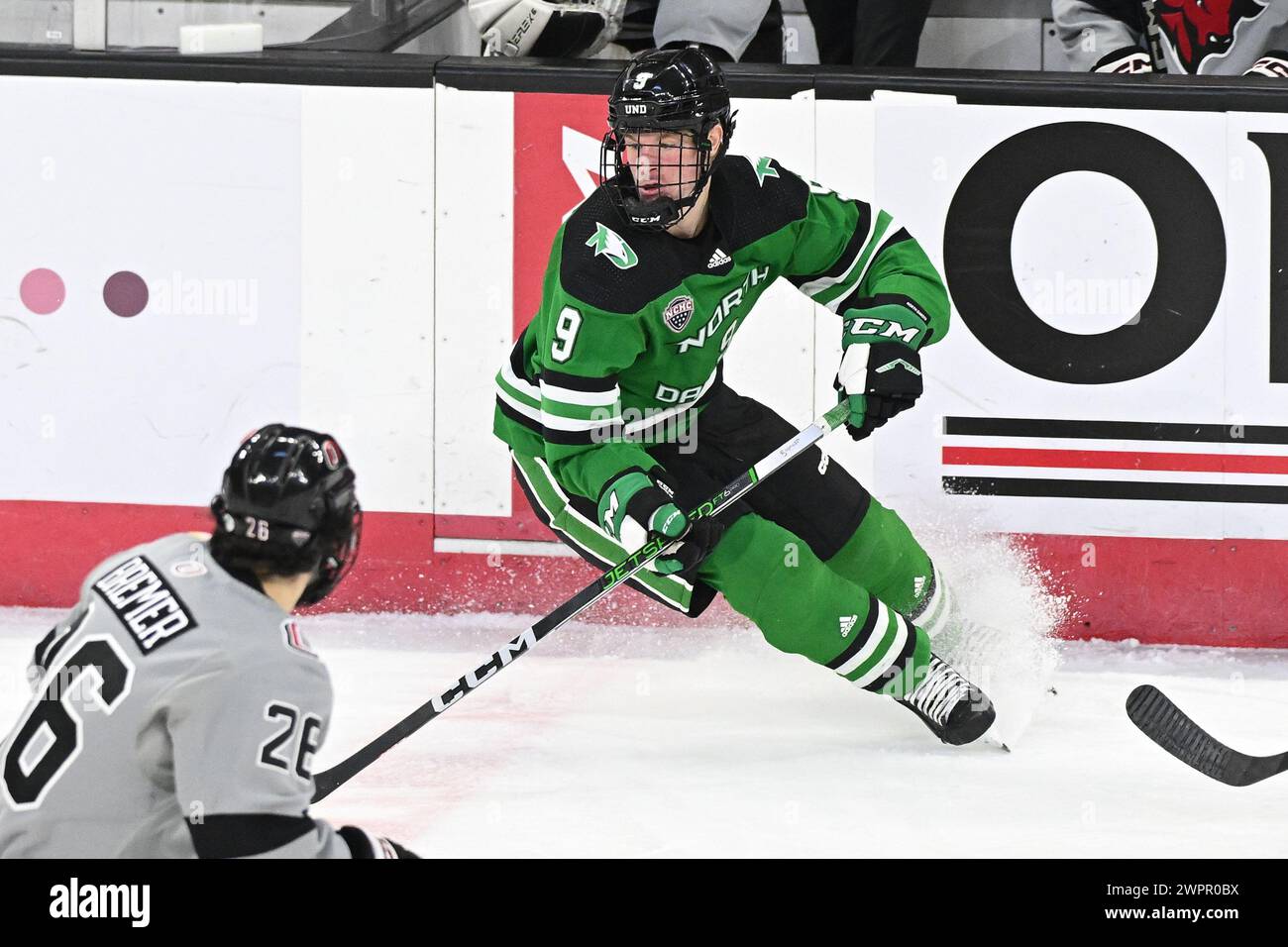 North Dakota Fighting Hawks Forward Jackson Blake 9 Plays The Puck north-dakota-fighting-hawks-forward-jackson-blake-9-plays-the-puck