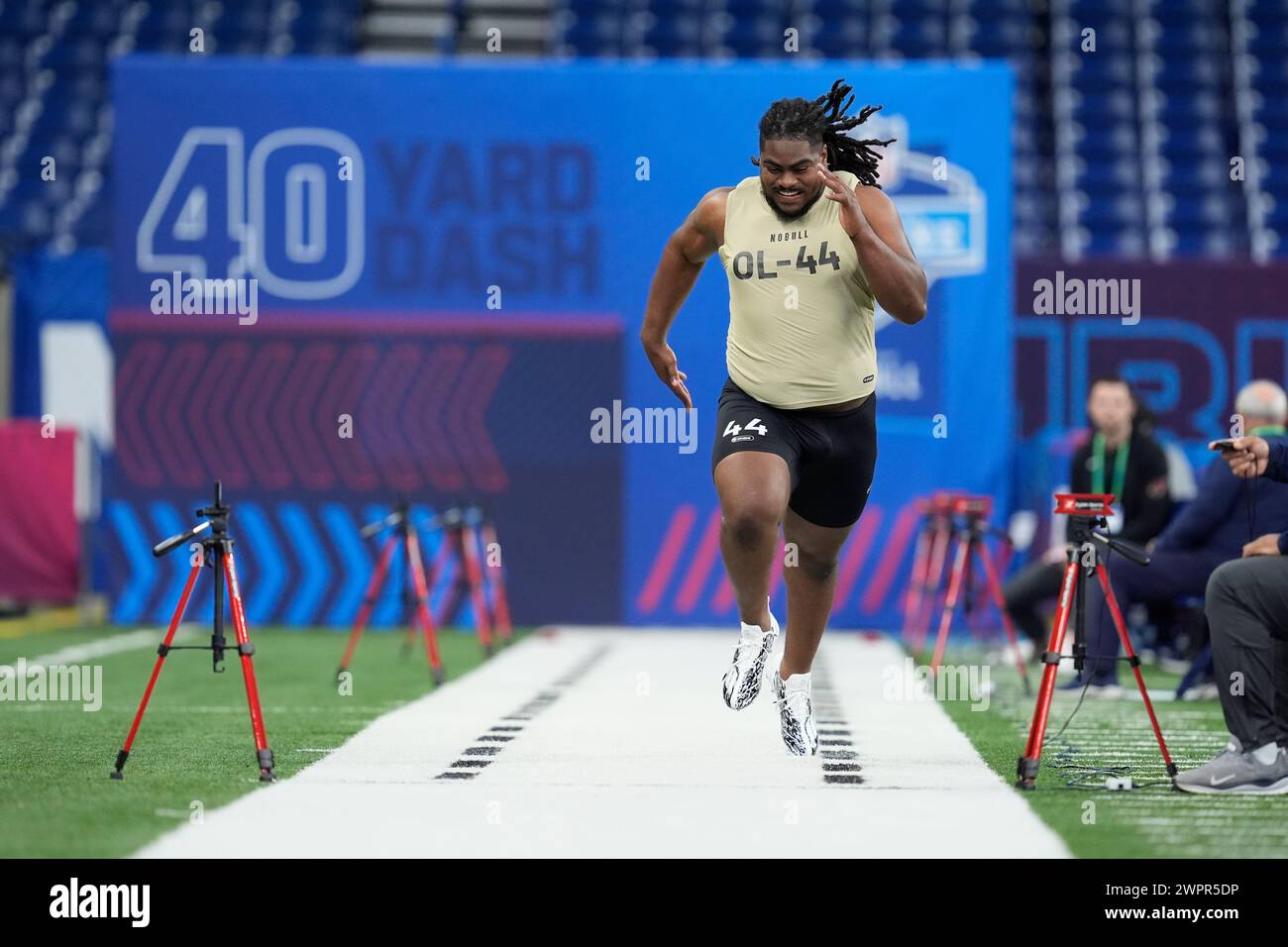 Kansas State offensive lineman KT Leveston runs a drill at the NFL ...