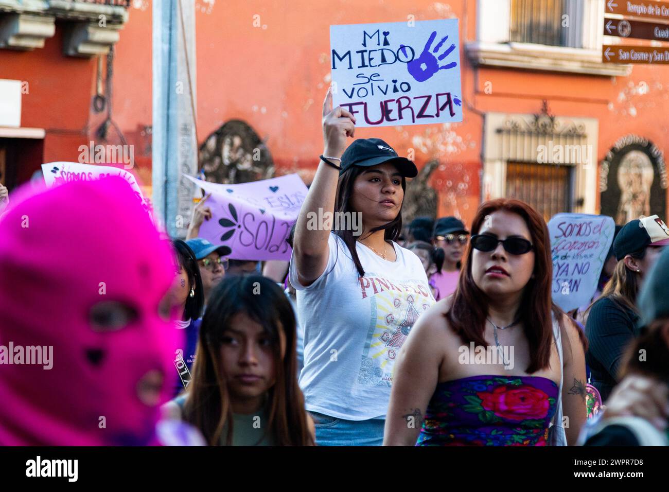 March 8, 2024, Playa del Carmen, Mexico A woman takes part during a