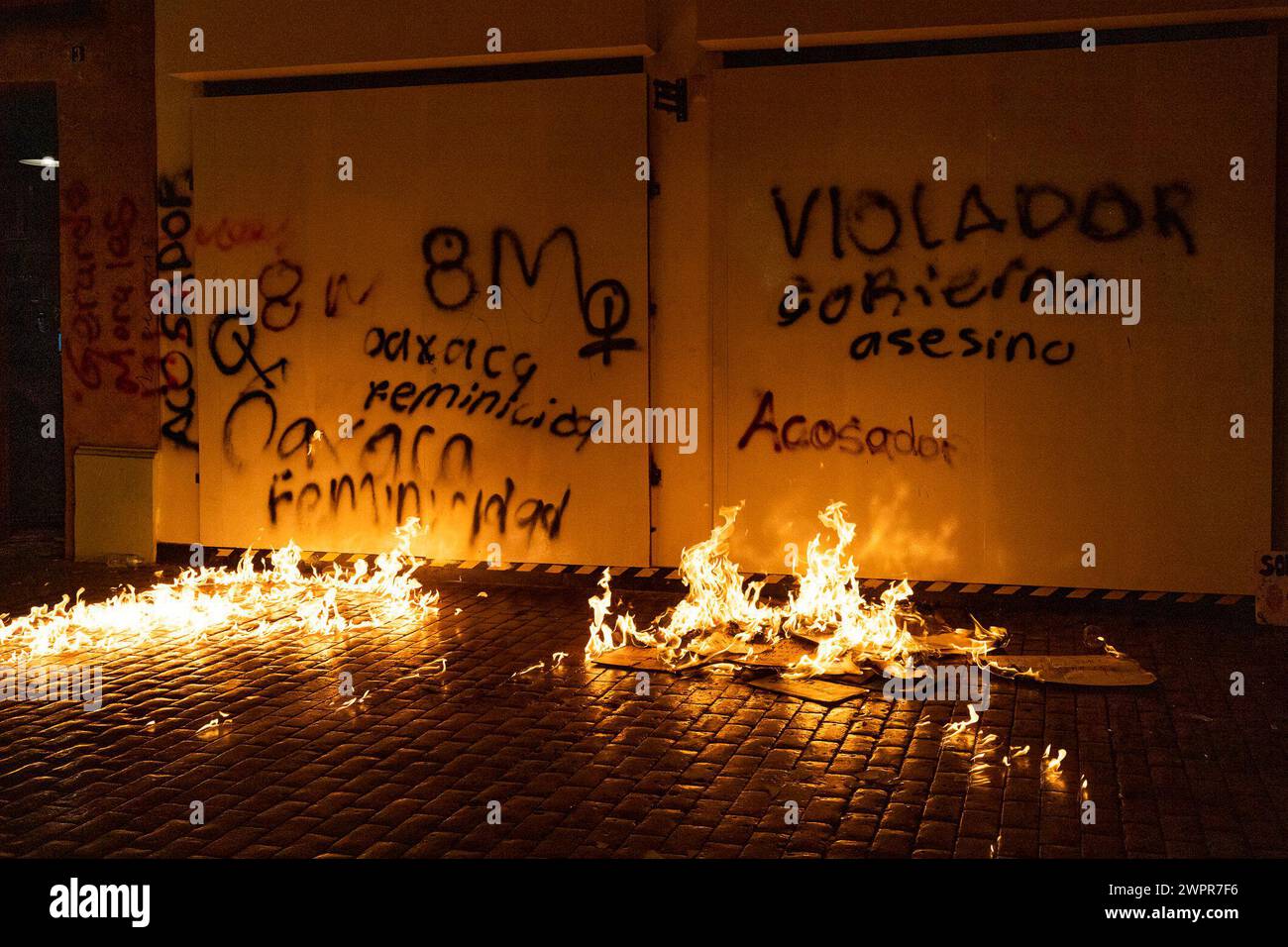 March 8, 2024, Playa del Carmen, Mexico Women set fire to the entrance