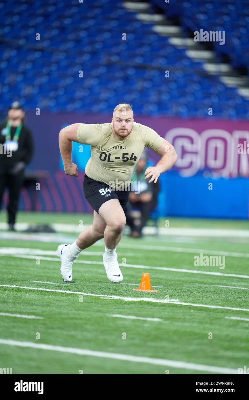 Michigan offensive lineman Drake Nugent runs a drill at the NFL ...