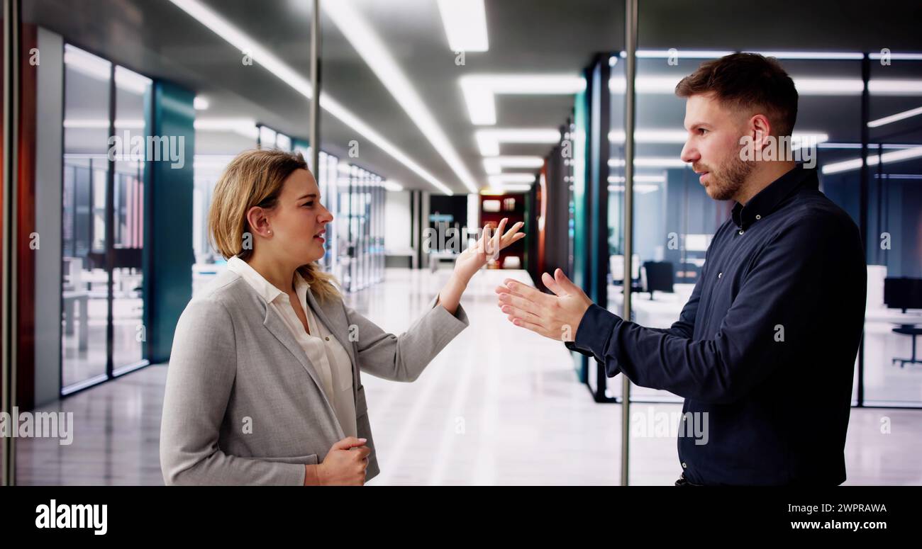 Office Argument And Quarrel. Man And Woman Conflict Stock Photo