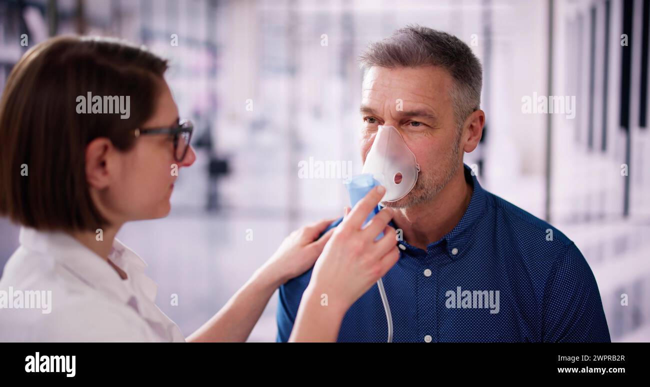 Oxygen Mask For Pulmonary Disease And Fibrosis. Man Inhaling Stock ...