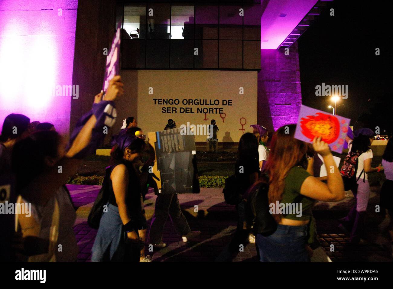 Monterrey, Mexico. 08th Mar, 2024. Demonstrators pass a sign that reads 'I am propud to be northern' during the international women's day demonstrations in, Monterrey, Mexico on March 8, 2024. Photo by: Paola Santoy/Long Visual Press Credit: Long Visual Press/Alamy Live News Stock Photo
