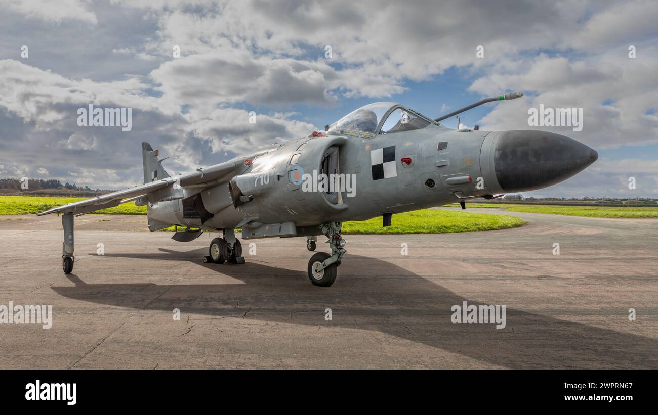 A close up of a BAe Sea Harrier FRS.2 as it is parked on the runwayr. The military aircraft was manufactured by Hawker Siddley and British Aerospace. Stock Photo