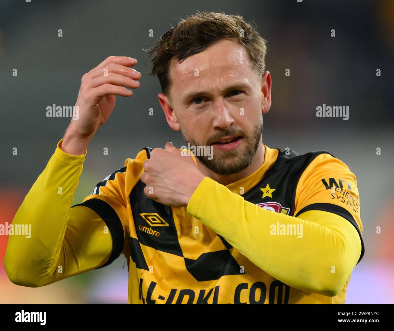 Dresden, Germany. 08th Mar, 2024. Soccer: 3rd division, SG Dynamo Dresden - TSV 1860 Munich, Matchday 29, Rudolf-Harbig-Stadion. Dynamo's Lucas Cueto stands on the pitch after the match. Credit: Robert Michael/dpa/Alamy Live News Stock Photo