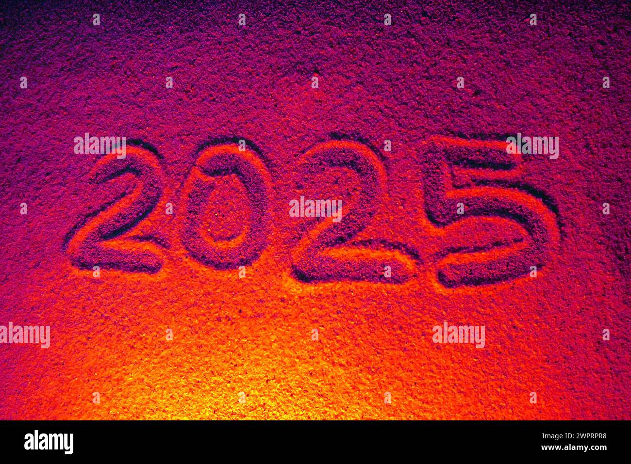 Handwritten New Year 20205 in the sand Stock Photo