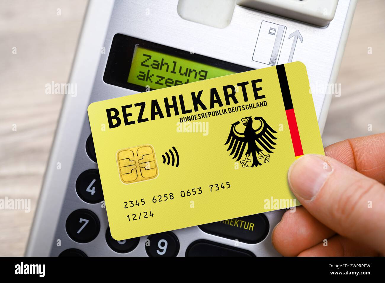 Payment Card For Refugees And Asylum Seekers In Front Of A Card Reader, Symbolic Photo, Photomontage Stock Photo