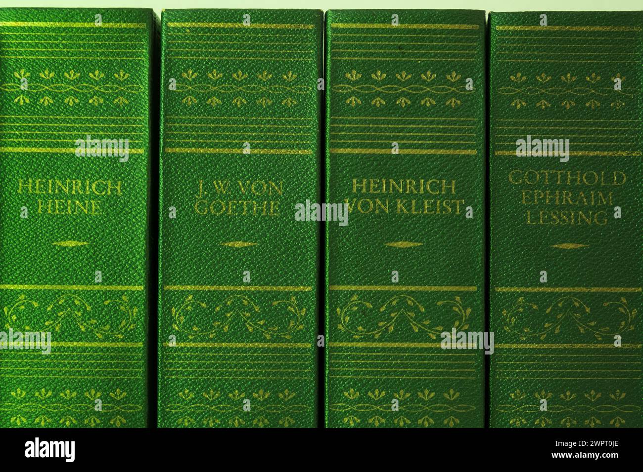 Old books with green covers or book edges are tested for the toxic arsenic. Stock Photo