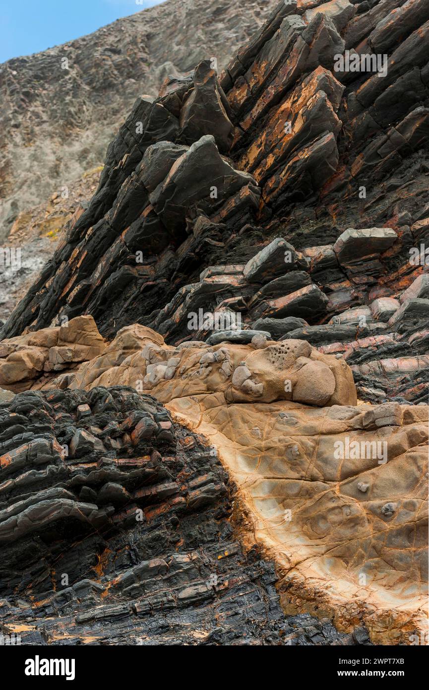 Rock layers on the Portuguese Atlantic coast, geology, grey, beige, nature, natural stone, rock, earth history, rocks, rocky coast, climate, history Stock Photo