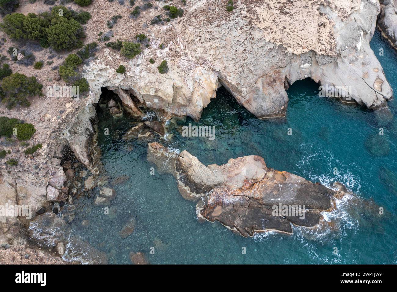 Aerial view of the cliffs at Gerontas Beach, Milos, Cyclades, Greece Stock Photo