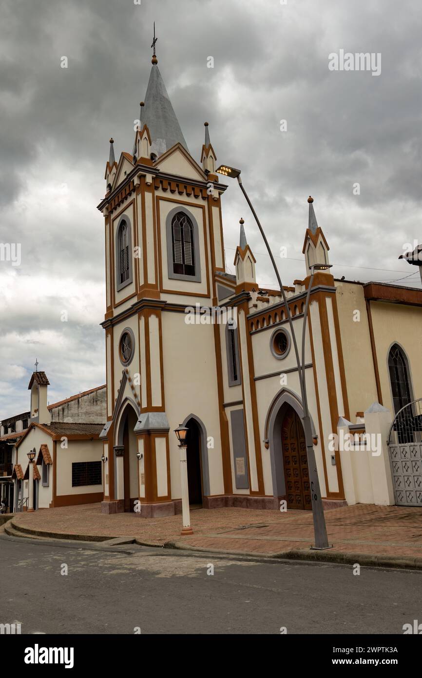 Side view of the church of Our Lady of Amparo in the town of Arcabuco, in central Colombia, against an overcast sky. Stock Photo