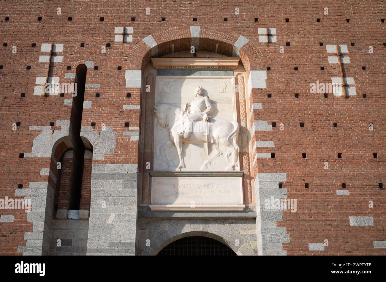 The bas relief of King Umberto I above the main entrance to Castello Sforzesco, or Milan Castle, in the heart of Milan, Italy. Stock Photo