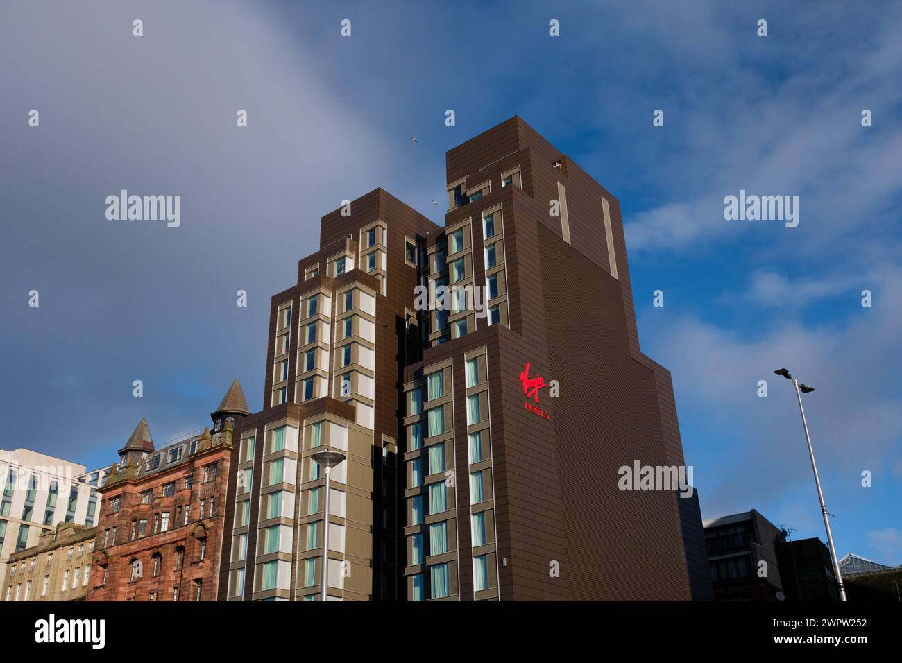 Glasgow Scotland: 12th Feb 2024: exterior of Vigin Hotel in Glasgow City on sunny day Stock Photo