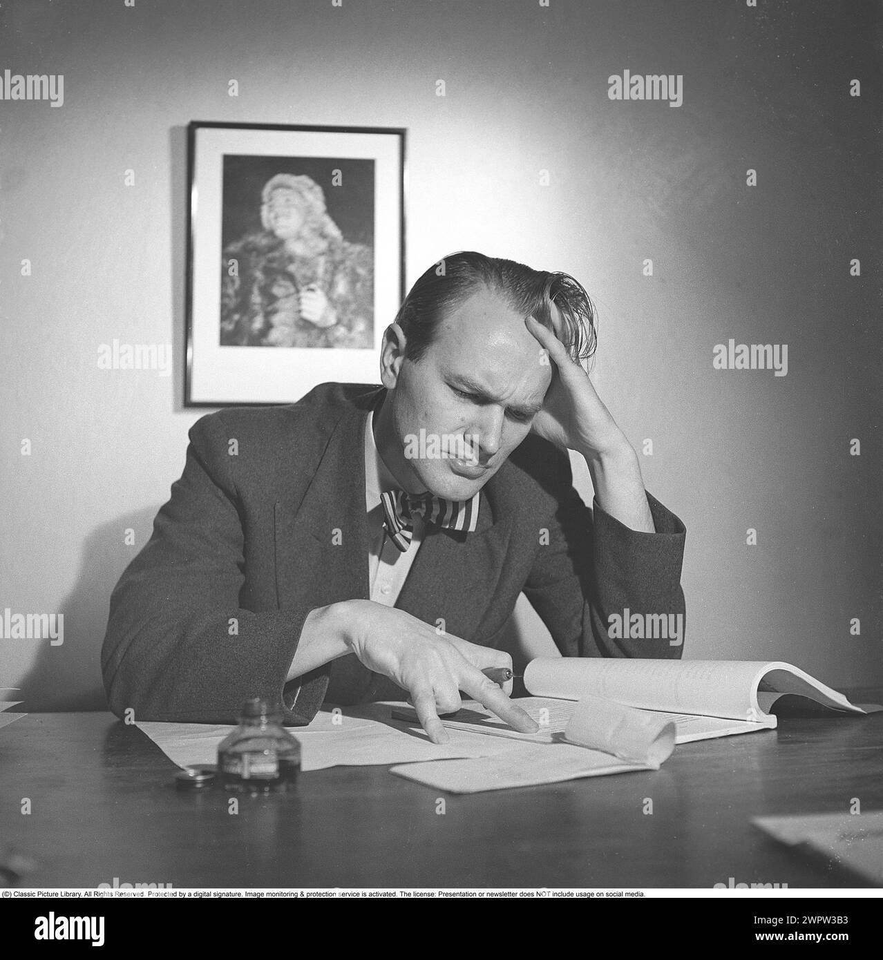 man-looks-documents-income-tax-hi-res-stock-photography-and-images-alamy