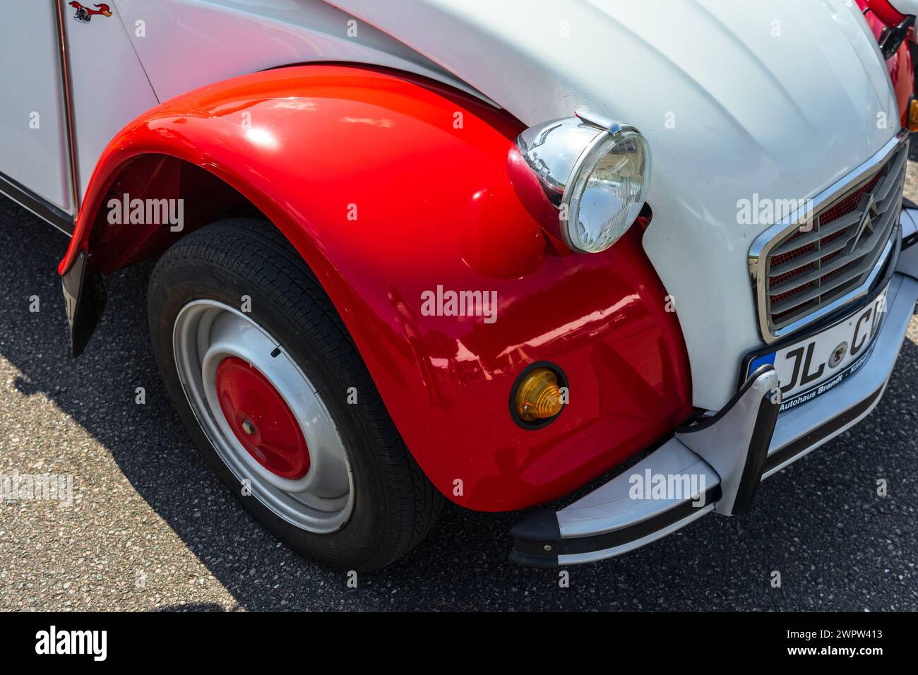 LINTHE, GERMANY - MAY 27, 2023: The fragment of economy car Citroen 2CV. Die Oldtimer Show 2023. Stock Photo