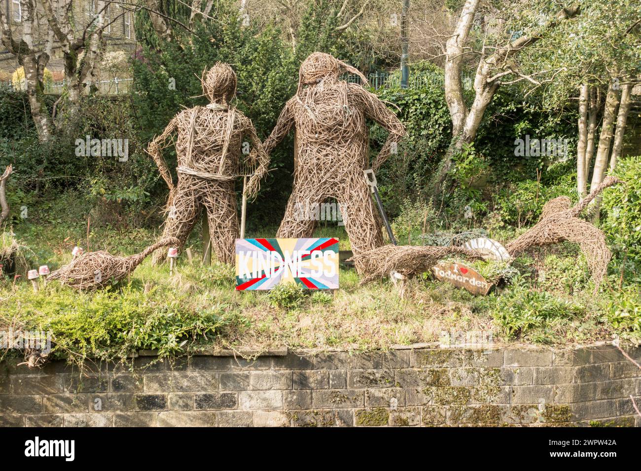 Mr and Mrs Incredible Edible as wicker figures in Todmorden, West Yorkshire, England, UK Stock Photo