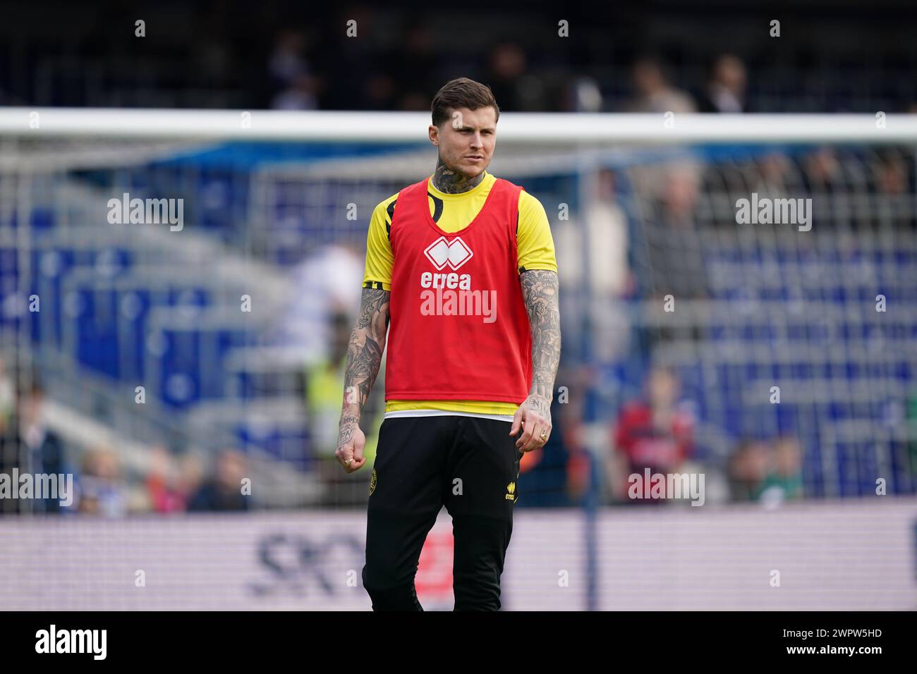LONDON, ENGLAND - MARCH 9: Lyndon Dykes of Queens Park Rangers warming up prior to the Sky Bet Championship match between Queens Park Rangers and Middlesbrough at Loftus Road on March 9, 2024 in London, England.(Photo by Dylan Hepworth/MB Media) Stock Photo