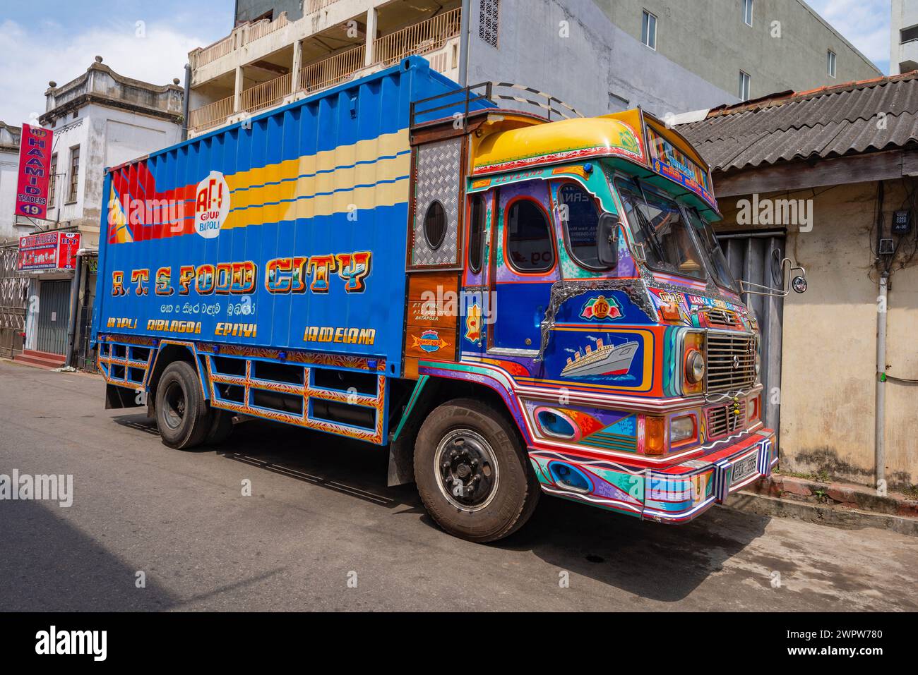 COLOMBO, SRI LANKA - FEBRUARY 22, 2020: A multicolored truck on a city street. Colombo, Sri Lanka Stock Photo