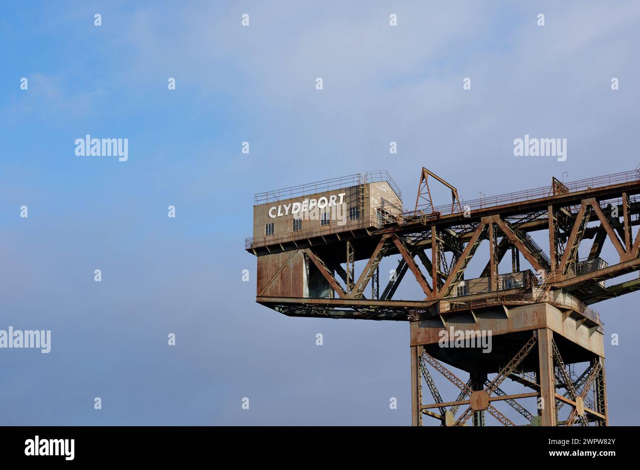 Glasgow Scotland: 13th Feb 2024: Finnieston Crane on a sunny golden hour morning with copy space Stock Photo