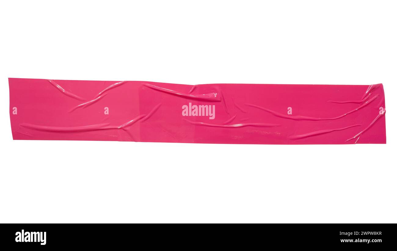 A piece of long pink plastic tape on white background with clipping path Stock Photo