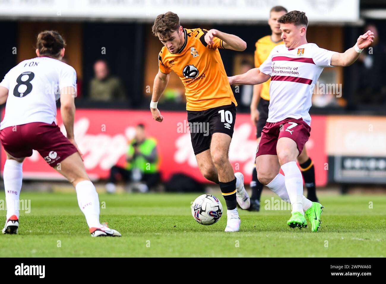 Jack Lancaster (10 Cambridge United) challenged by Sam Haskins (7 Northampton Town) during the Sky Bet League 1 match between Cambridge United and Northampton Town at the Cledara Abbey Stadium, Cambridge on Saturday 9th March 2024. (Photo: Kevin Hodgson | MI News) Credit: MI News & Sport /Alamy Live News Stock Photo
