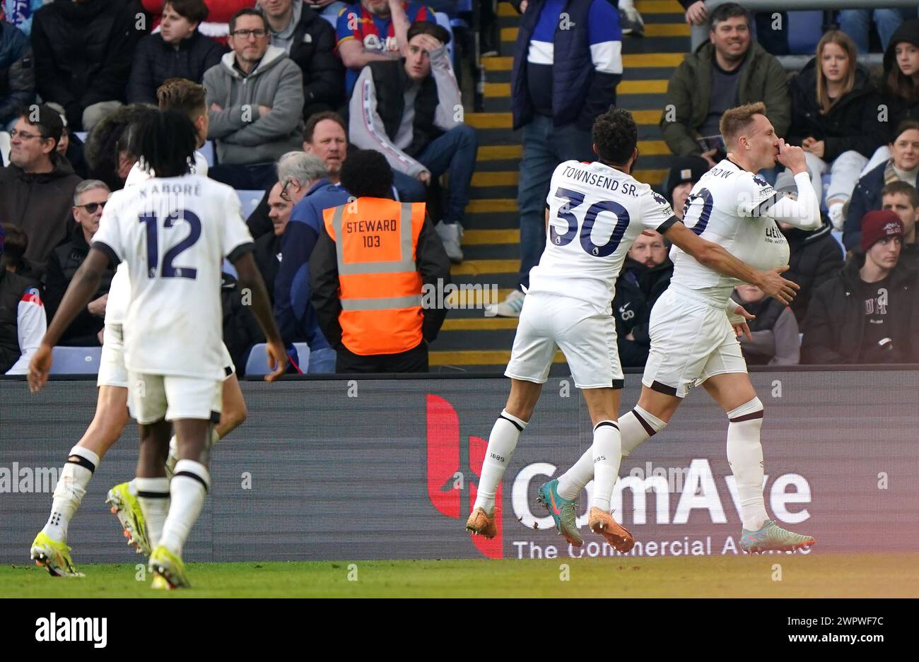 Luton Town's Cauley Woodrow (right) celebrates scoring their side's first goal of the game during the Premier League match at Selhurst Park, London. Picture date: Saturday March 9, 2024. Stock Photo