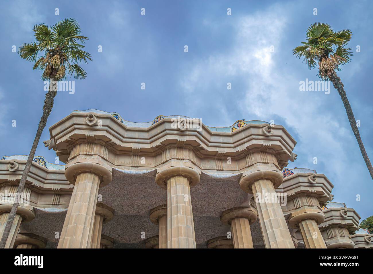 BARCELONA, SPAIN-FEB. 28, 2022: The Hypostyle Hall or Hall of the Hundred Columns, with 86 columns that supports the central terrace of Parc Güell, de Stock Photo