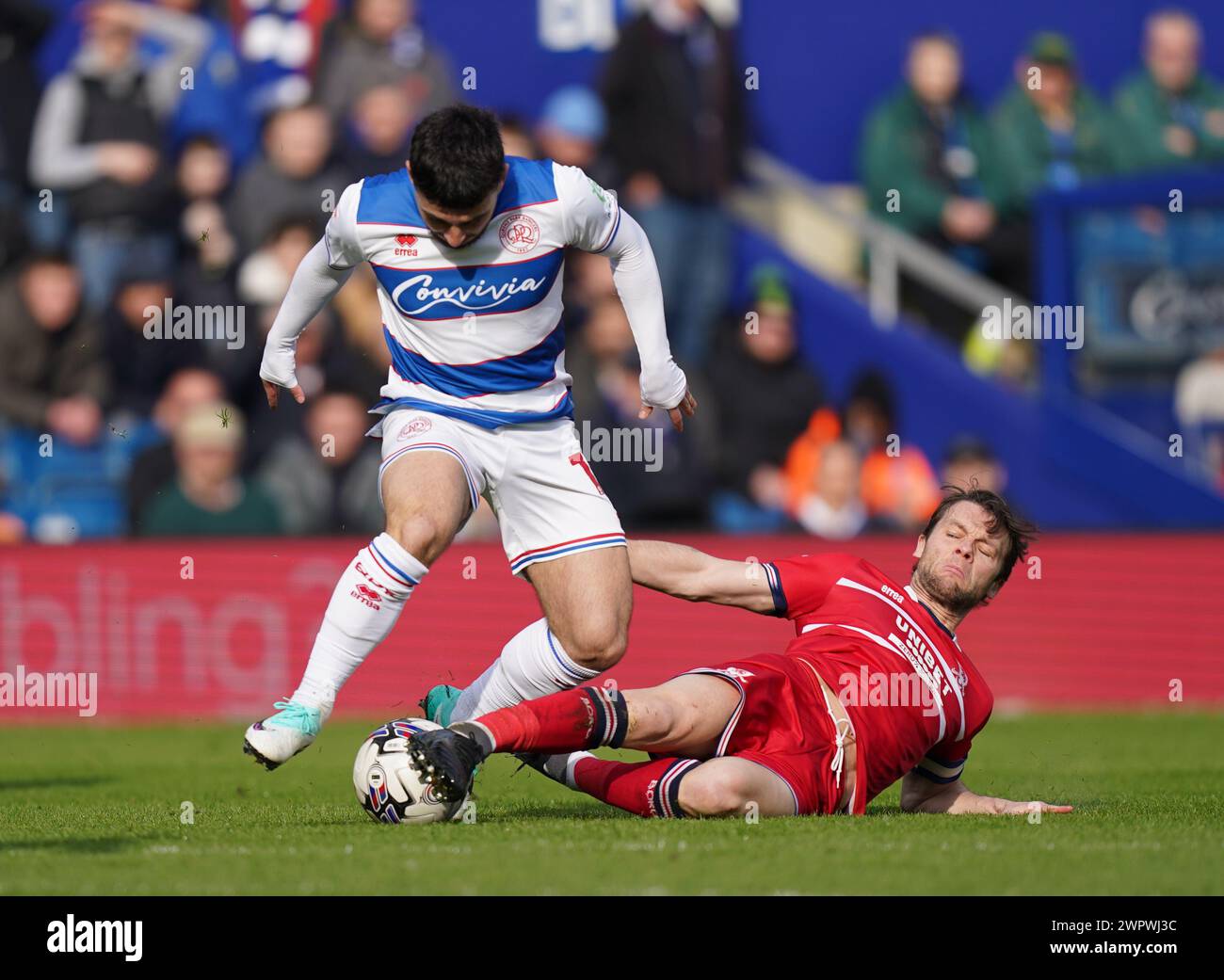 LONDON, ENGLAND - MARCH 9: Ilias Chair of Queens Park Rangers being tackled by Jonathan Howson of Middlesbrough during the Sky Bet Championship match between Queens Park Rangers and Middlesbrough at Loftus Road on March 9, 2024 in London, England.(Photo by Dylan Hepworth/MB Media) Stock Photo