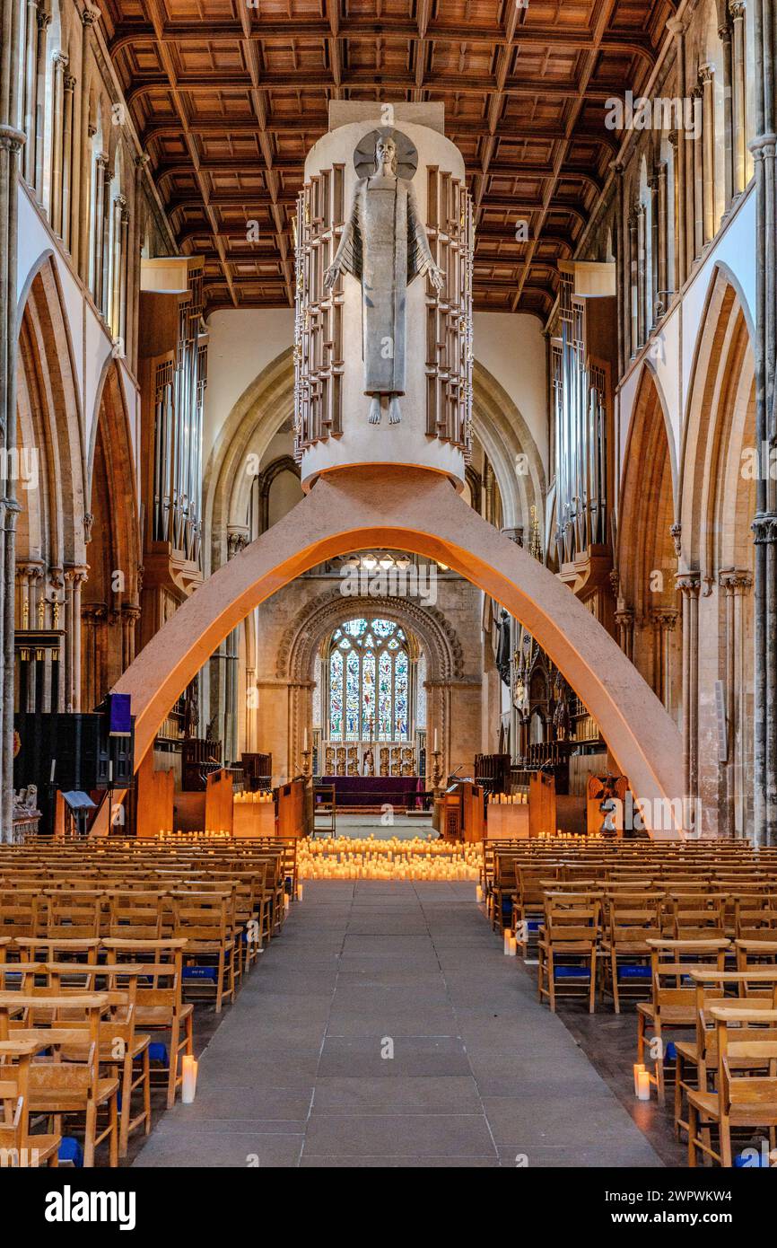 Candle lit interior of Llandaff Cathedral, Cardiff, Wales. Hundreds of candles lighting up