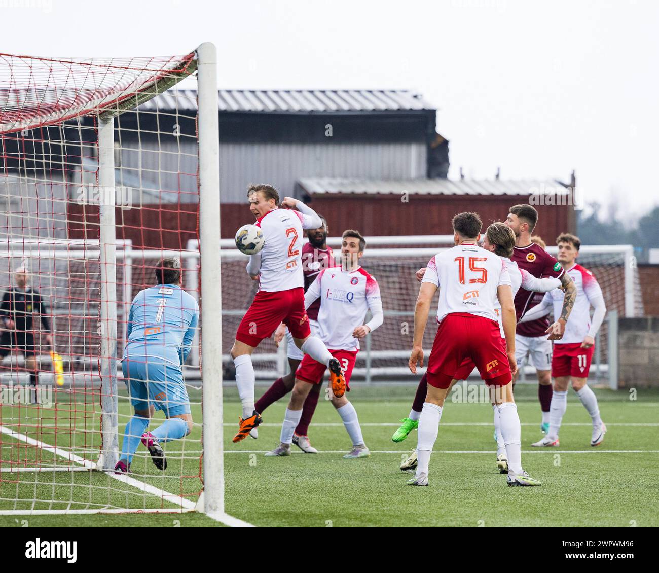 Stenhousemuir, Scotland. 09 March 2024.   Kieran Watson (2 - Spartans) heads a Stenhousemuir corner back to Blair Carswell (GK 1 - Spartans)   Credit: Raymond Davies / Alamy Live News Stock Photo