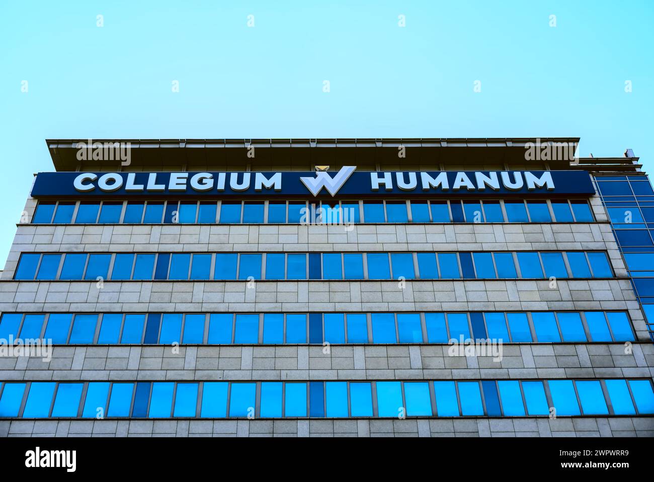 Building of Collegium Humanum in Warsaw, higher education institution, tight shot from below 2 Stock Photo