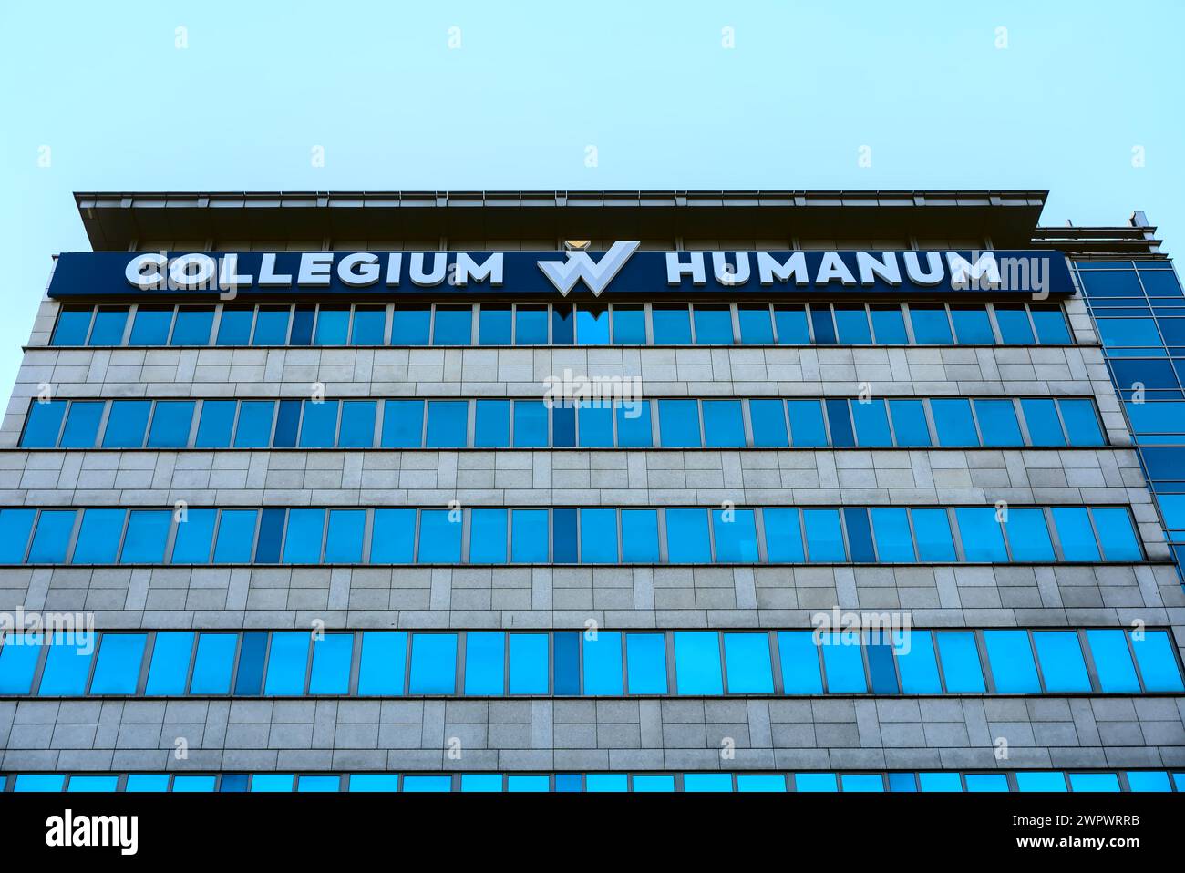 Building of Collegium Humanum in Warsaw, higher education institution, tight shot from below 3 Stock Photo