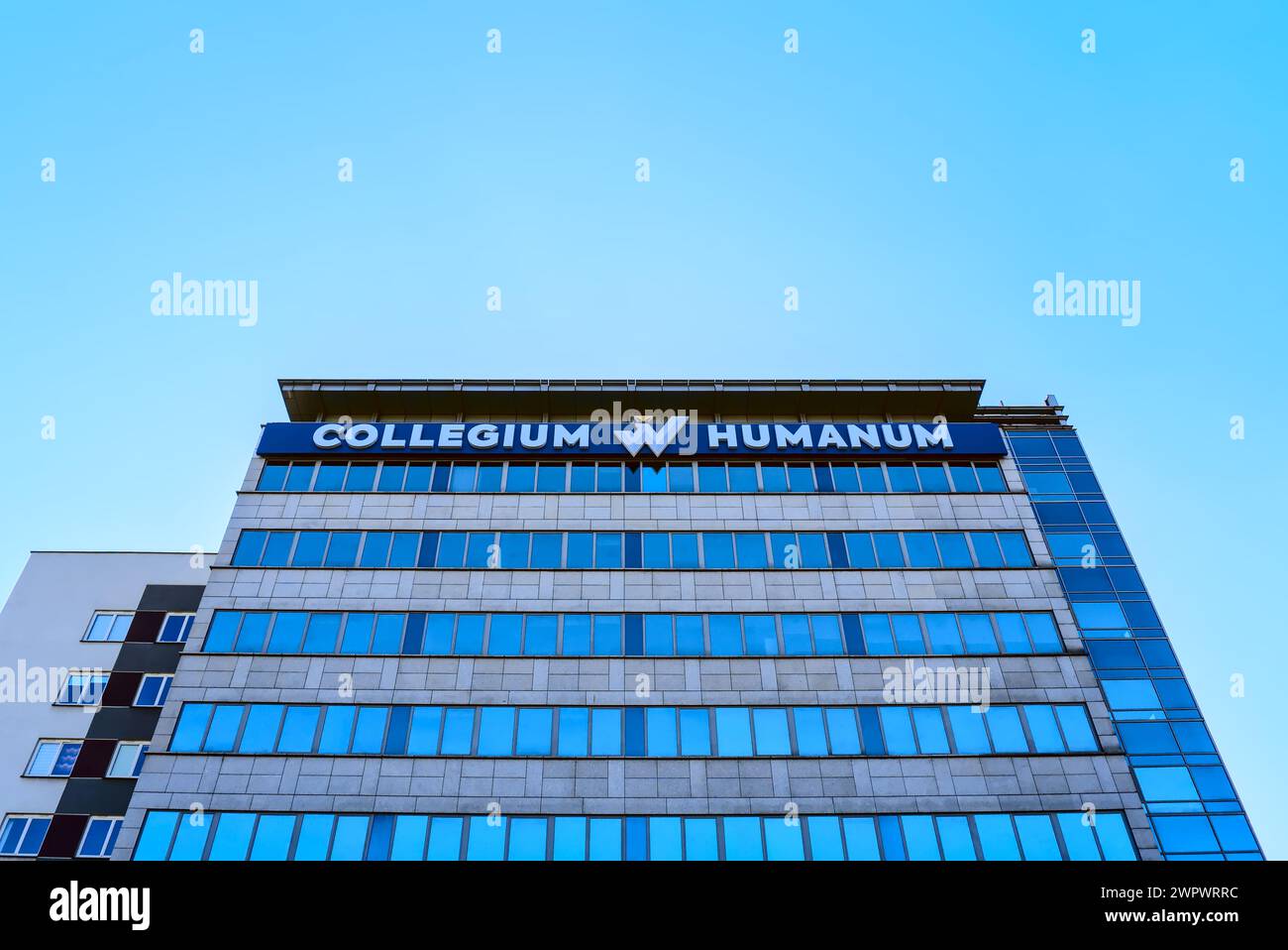 Building of Collegium Humanum in Warsaw, higher education institution, wide shot from below Stock Photo
