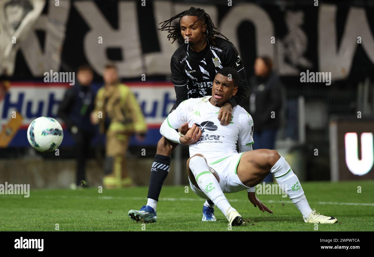 Charleroi, Belgium. 09th Mar, 2024. Cercle's Felipe Augusto and Charleroi's Jeremy Petris fight for the ball during a soccer match between Sporting Charleroi and Cercle Brugge, Saturday 09 March 2024 in Charleroi, on day 29 of the 2023-2024 'Jupiler Pro League' first division of the Belgian championship. BELGA PHOTO VIRGINIE LEFOUR Credit: Belga News Agency/Alamy Live News Stock Photo