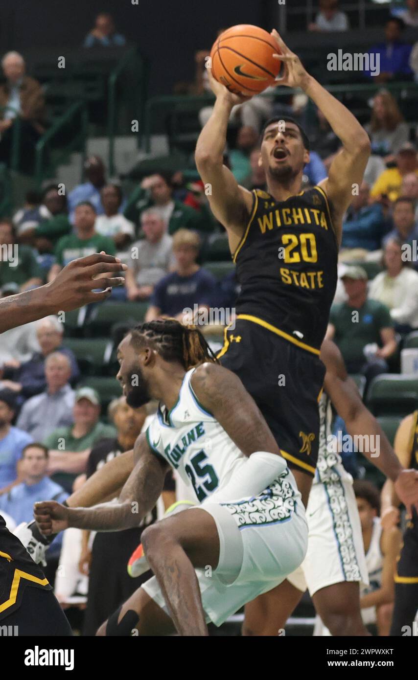 New Orleans, USA. 08th Mar, 2024. Wichita State Shockers guard Harlond Beverly (20) shoots a jumper over Tulane Green Wave guard Jaylen Forbes (25) during an American Athletic Conference men's basketball game at Fogleman Arena in New Orleans, Louisiana on Friday, March 8, 2024. (Photo by Peter G. Forest/Sipa USA) Credit: Sipa USA/Alamy Live News Stock Photo