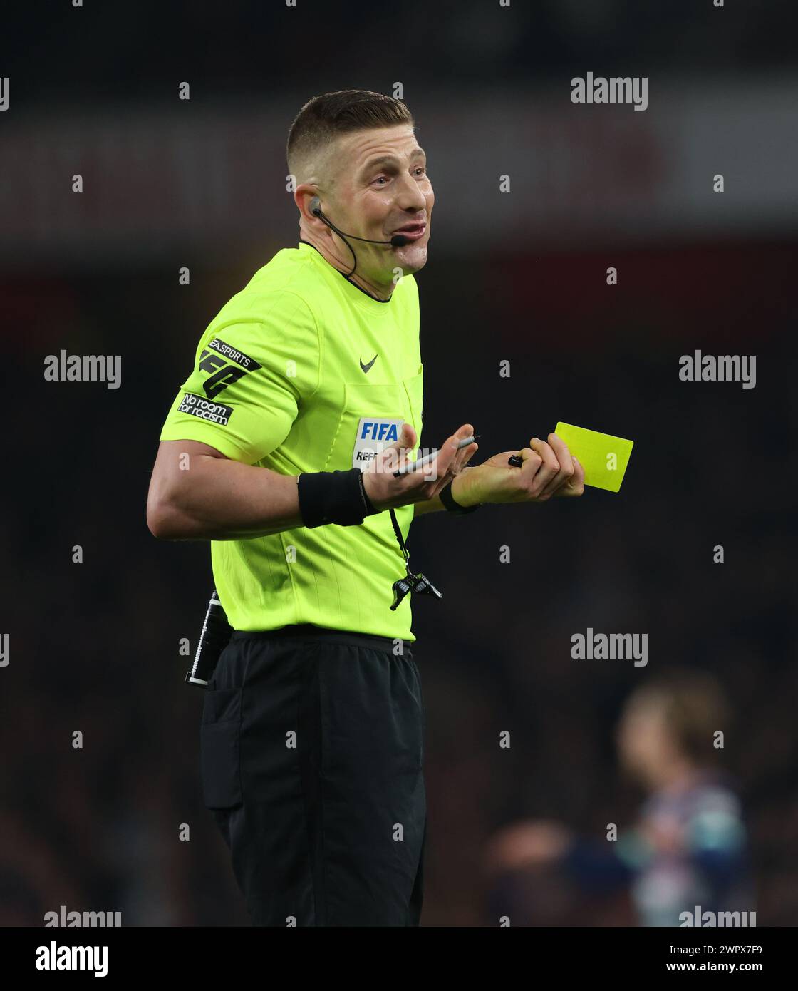 London, UK. 09th Mar, 2024. Referee Robert Jones holds a yellow card at the Arsenal v Brentford EPL match, at the Emirates Stadium, London, UK on 9th March, 2024. Credit: Paul Marriott/Alamy Live News Stock Photo