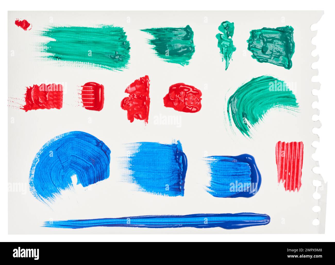 Brush strokes, drops of multi-colored oil paint on a white paper ...